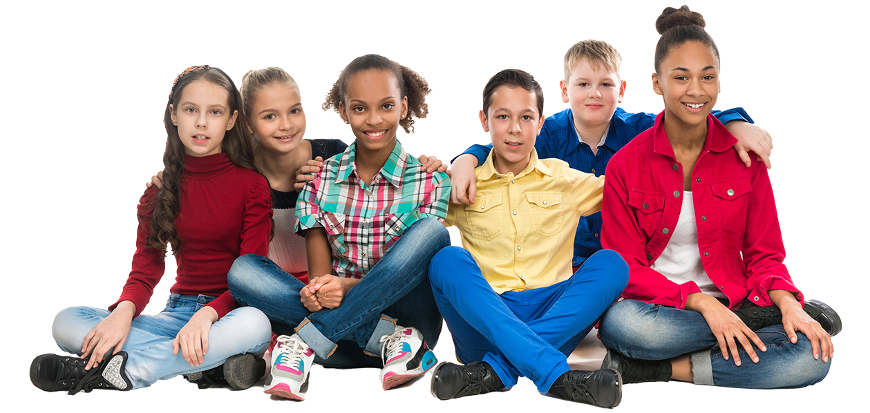 group of diverse smiling teens sitting on floor.